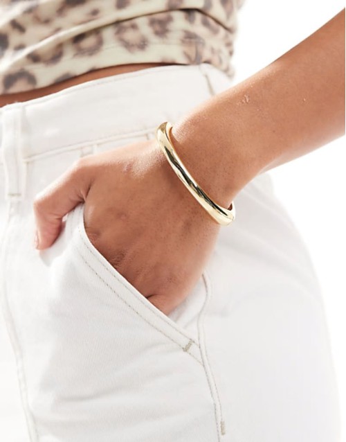 simple bangle bracelet in gold tone